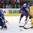 MINSK, BELARUS - MAY 15: Sweden's Jimmie Ericsson #21 reaches for a bouncing puck in front of France's Florian Hardy #49 during preliminary round action at the 2014 IIHF Ice Hockey World Championship. (Photo by Richard Wolowicz/HHOF-IIHF Images)

